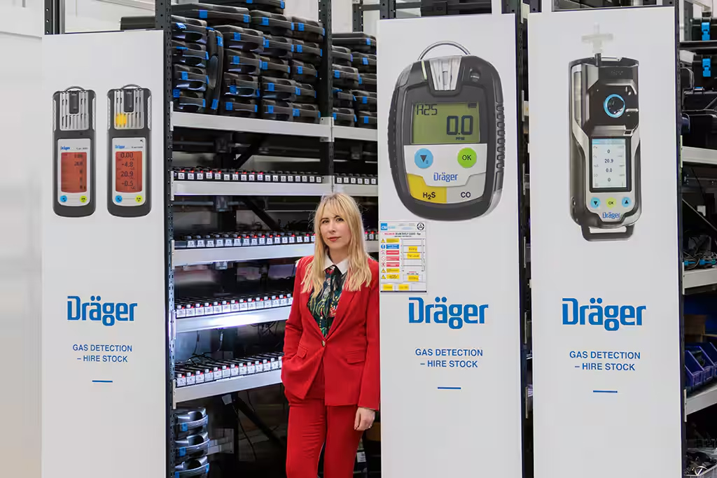 Megan in front of the rental shop